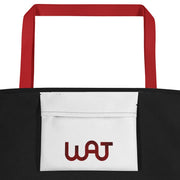 Inside view of the black My Commitment Different WAJ Large Tote Bag with red handle.