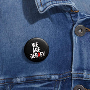 The We Are Jersey Pin Button pinned to a jean jacket.