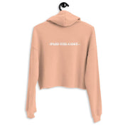 Back view of the peach colored My Commitment Different Crop Hoodie.