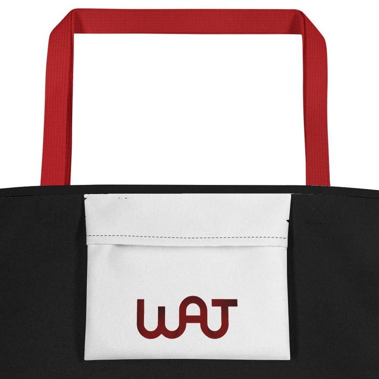 Inside view of the black My Commitment Different WAJ Large Tote Bag with red handle.