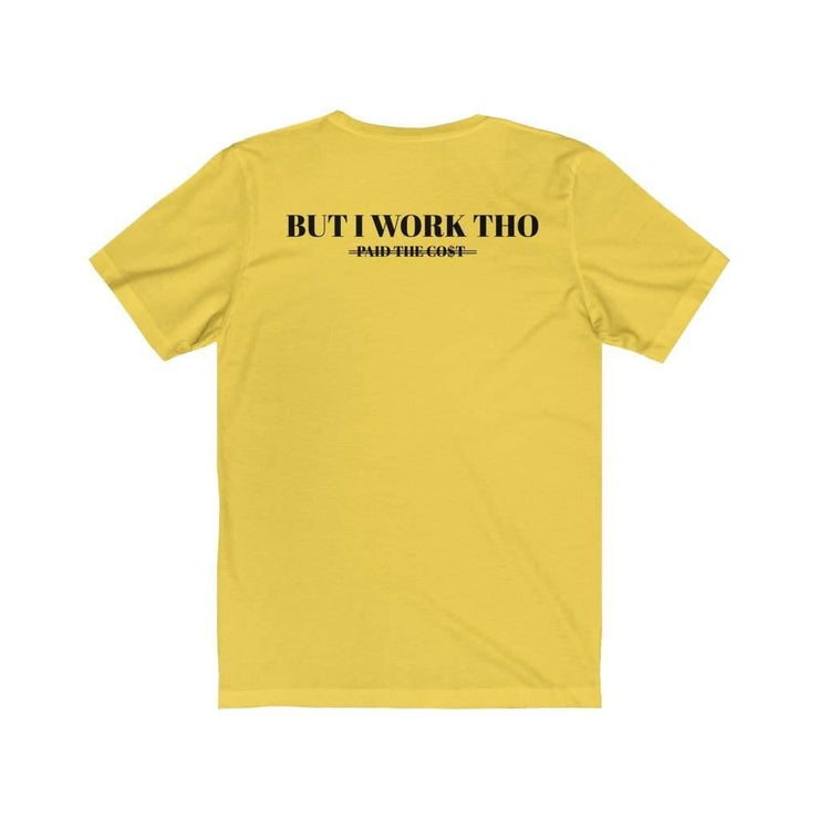 Back view of the yellow Paid The Cost Short Sleeve Tee with the words But I Work Tho in black text along the black .