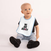 We Are Jersey Baby Bib mock up with a blue outline.