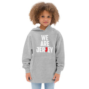Female child wearing the grey We Are Jersey Kids Hoodie.