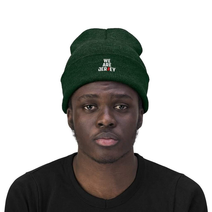 Male wearing the We Are Jersey Forrest green Knit Beanie.